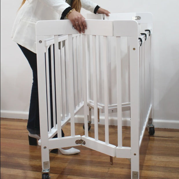 Folding wooden crib online